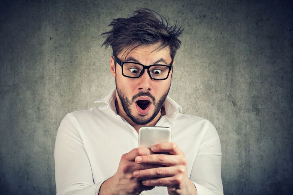 Man Looking at Phone